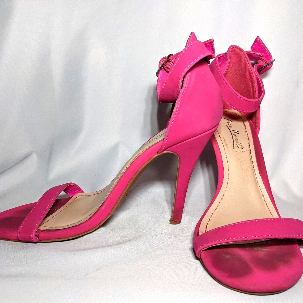 Well worn pink heels